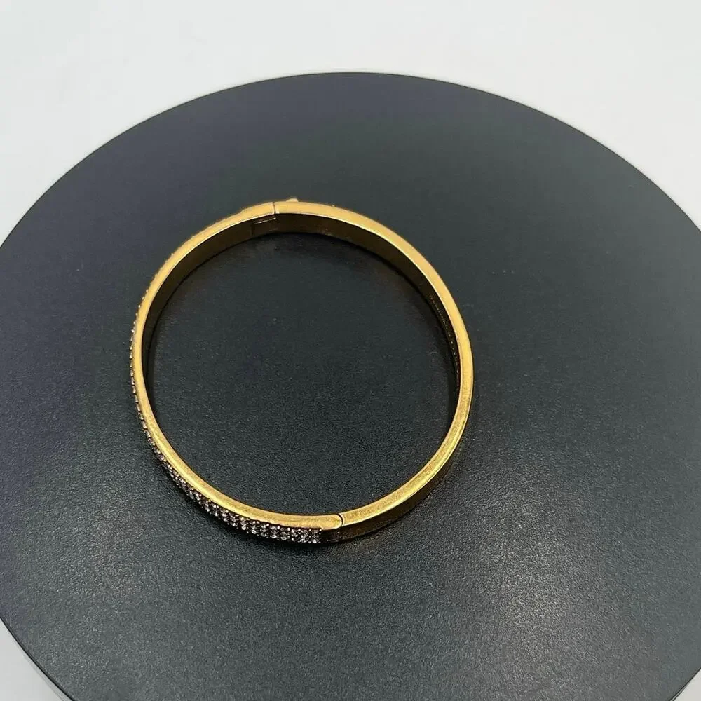 Kate Spade NY Heavy‎ Metals Row Pave Hinged Bangle Bracelet in clear/rose gold